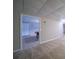 Open basement space showcasing access to the carpeted billiards room at 240 Wrights Mill Way, Canton, GA 30115
