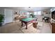Billiards room with a classic pool table, modern decor, and accent shelving at 240 Wrights Mill Way, Canton, GA 30115