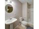 Neutrally decorated bathroom with updated vanity, toilet, and shower at 240 Wrights Mill Way, Canton, GA 30115