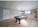 Basement with a billiards room featuring a pool table and accent lighting at 240 Wrights Mill Way, Canton, GA 30115