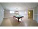Basement billiards room showcasing a pool table and natural lighting at 240 Wrights Mill Way, Canton, GA 30115