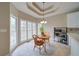 Inviting breakfast nook with bright windows and stylish tile flooring at 240 Wrights Mill Way, Canton, GA 30115