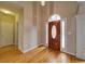 Inviting foyer with hardwood floors and an elegant front door at 240 Wrights Mill Way, Canton, GA 30115