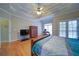 Spacious main bedroom with hardwood floors, tray ceilings and a ceiling fan at 240 Wrights Mill Way, Canton, GA 30115