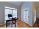 Bright office space with large windows and hardwood floors near a door to outside at 240 Wrights Mill Way, Canton, GA 30115