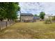 Large fenced backyard offers privacy and plenty of room for outdoor activities at 3420 Sweetbriar Ln, Powder Springs, GA 30127
