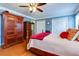 Spacious bedroom with ample closet space, ceiling fan, and well-maintained hardwood floors at 3420 Sweetbriar Ln, Powder Springs, GA 30127