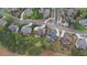 An attractive aerial view showcases the neighborhood's well-maintained lawns and mature trees, creating a park-like setting at 5224 Brendlynn Dr, Suwanee, GA 30024