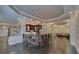 Entertainment space with full bar, ample seating, and custom lighting at 5224 Brendlynn Dr, Suwanee, GA 30024