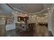 Entertain guests at the stylish wet bar, featuring seating for eight and modern appliances at 5224 Brendlynn Dr, Suwanee, GA 30024