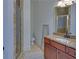 Bathroom with shower, toilet and sink with granite countertop at 5224 Brendlynn Dr, Suwanee, GA 30024