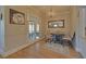 A dining area with doors leading to deck and chandelier at 5224 Brendlynn Dr, Suwanee, GA 30024