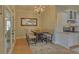 A cozy dining area featuring a table with seating and a chandelier at 5224 Brendlynn Dr, Suwanee, GA 30024