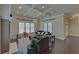 Cozy living room with dark hardwood floors and coffered ceiling with stylish decor at 5224 Brendlynn Dr, Suwanee, GA 30024