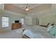 Large main bedroom features trey ceiling, sitting area, and windows at 5224 Brendlynn Dr, Suwanee, GA 30024