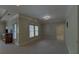 Bedroom sitting area with large windows, neutral carpet and base trim at 5224 Brendlynn Dr, Suwanee, GA 30024