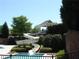 A winding waterslide in a community pool area, offering hours of entertainment for residents of all ages at 5224 Brendlynn Dr, Suwanee, GA 30024
