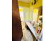 View of bathroom with sink, mirror, toilet and washing machine at 1145 Crestview Ne Cir, Conyers, GA 30012