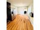 Kitchen area with hardwood flooring and a stainless steel refrigerator at 1145 Crestview Ne Cir, Conyers, GA 30012