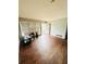 Spacious living room with beautiful hardwood floors and a bright front door at 1145 Crestview Ne Cir, Conyers, GA 30012