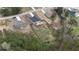 Expansive fenced backyard with a wooden deck, complemented by mature trees and a well-maintained lawn at 313 Bonnie Sue Dr, Villa Rica, GA 30180