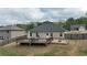 This backyard has a wood deck, patio, and fenced in yard at 313 Bonnie Sue Dr, Villa Rica, GA 30180