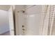 This is a bathroom shower and tub with white tile and a shower curtain at 313 Bonnie Sue Dr, Villa Rica, GA 30180