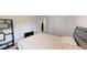 Bedroom featuring carpeting, a decorative shelf, and a view into the hall for a modern living space at 313 Bonnie Sue Dr, Villa Rica, GA 30180