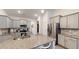 Modern kitchen with stainless steel appliances, granite countertops, ample cabinet space, and a breakfast bar at 313 Bonnie Sue Dr, Villa Rica, GA 30180