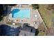 Aerial view of the community pool featuring ample lounge seating and a well-maintained deck area at 313 Bonnie Sue Dr, Villa Rica, GA 30180