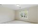 Neutral bedroom with a double window for ample natural light at 700 Henley Fields Cir, Johns Creek, GA 30097