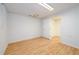 Finished basement space featuring wood-look floors at 1885 Oak Wind Ln, Buford, GA 30519