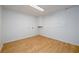 Spacious unfinished basement featuring wood-look floors and light walls at 1885 Oak Wind Ln, Buford, GA 30519