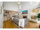 Bright, open living space with a fireplace, eat in kitchen, and dining area at 1885 Oak Wind Ln, Buford, GA 30519