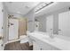 Bathroom features a glass-enclosed shower, ample counter space, and updated fixtures at 2191 Rockbridge Rd # 501, Stone Mountain, GA 30087