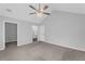 Spacious primary bedroom features ensuite access and a contemporary ceiling fan at 2191 Rockbridge Rd # 501, Stone Mountain, GA 30087