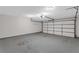 Attached garage offering secure parking and extra storage space for vehicles and equipment at 2191 Rockbridge Rd # 501, Stone Mountain, GA 30087