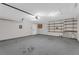 Attached garage offering storage shelves and ample space for your vehicles and belongings at 2191 Rockbridge Rd # 501, Stone Mountain, GA 30087