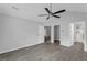 Large bedroom with modern flooring, ceiling fan, and ensuite bathroom at 2191 Rockbridge Rd # 501, Stone Mountain, GA 30087