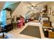 Spacious, multi-purpose attic featuring vaulted ceilings and multiple ceiling fans at 2210 Holly Springs Rd, Rockmart, GA 30153