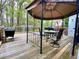 Backyard deck with outdoor seating and a grill at 2210 Holly Springs Rd, Rockmart, GA 30153