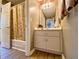 Bathroom with walk-in shower features a neutral palette and modern fixtures at 2210 Holly Springs Rd, Rockmart, GA 30153