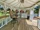 Comfortable gazebo with chairs and a small table offers the perfect outdoor spot for relaxation and enjoyment at 2210 Holly Springs Rd, Rockmart, GA 30153