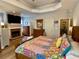 Spacious main bedroom with a fireplace and bright lighting at 2210 Holly Springs Rd, Rockmart, GA 30153