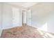 Bedroom featuring multiple closets and doors at 3651 Sapphire Ct, Decatur, GA 30034