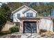 Charming home with a brick front and a one-car garage with ample parking on a tree lined street at 3651 Sapphire Ct, Decatur, GA 30034