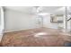 Inviting carpeted living room next to the kitchen with ample sunlight at 3651 Sapphire Ct, Decatur, GA 30034