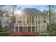Spacious two-story home featuring a private deck, patio, and lush backyard at 4002 Moheb Sw St, Atlanta, GA 30331