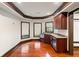 Basement wet bar area with granite countertops, stainless steel appliances, and hardwood floors at 4002 Moheb Sw St, Atlanta, GA 30331