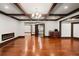 Spacious basement with hardwood floors, coffered ceilings, and recessed lighting at 4002 Moheb Sw St, Atlanta, GA 30331